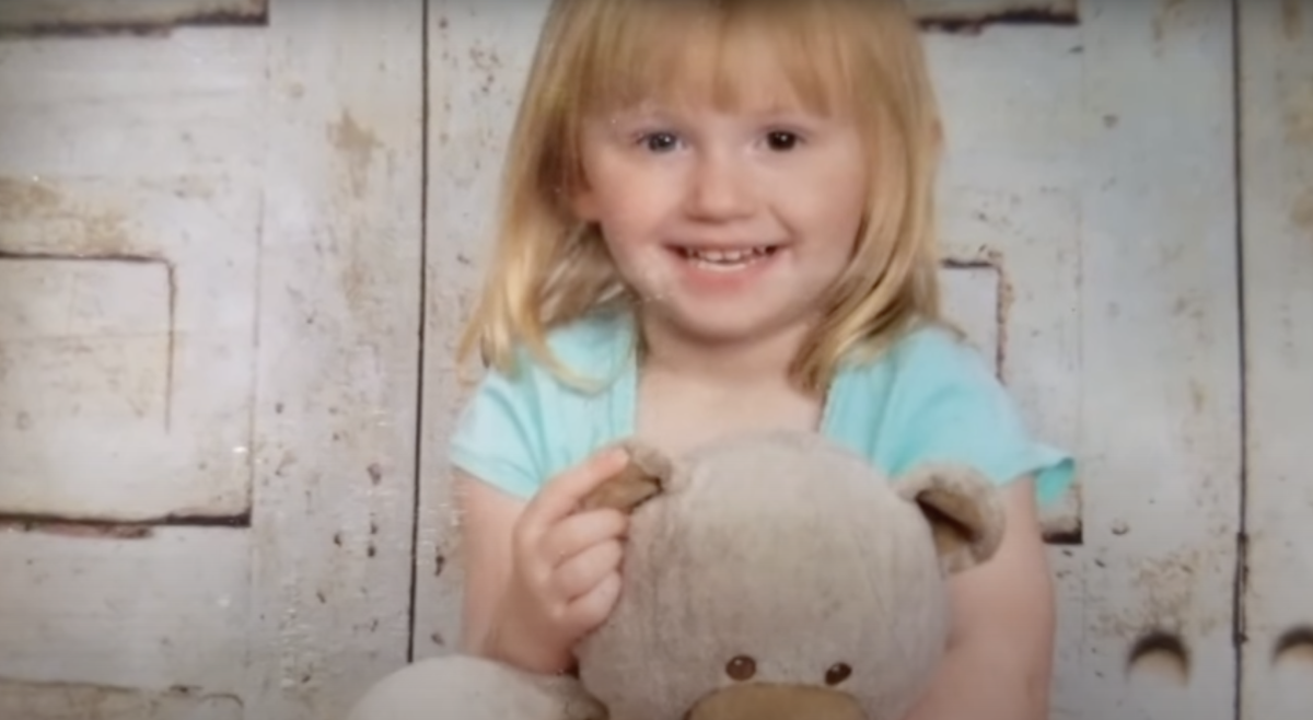 Charlee Campbell holding a teddy bear smiling, Photo Credit: Fox8 WGHP