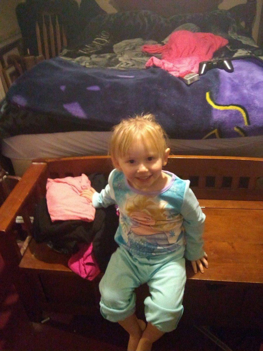 Charlee Campbell smiling and looking up at the camera while sitting down, Photo Credit: Facebook/Beth Campbell